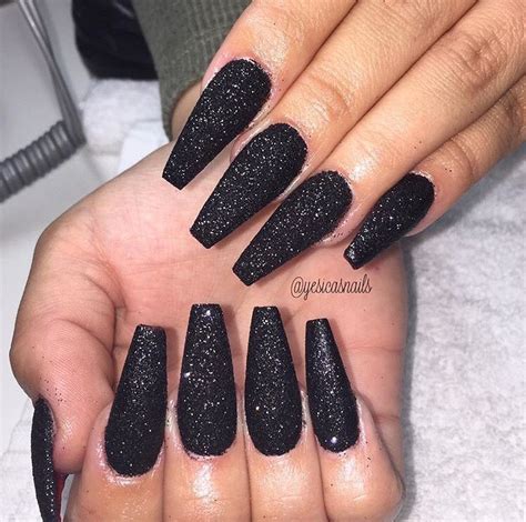 matte black and sparkle nails